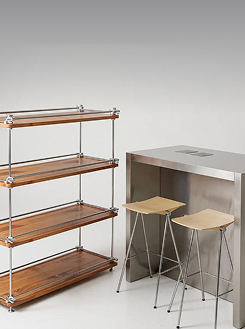 Stainless steel furniture including tables and shelving units